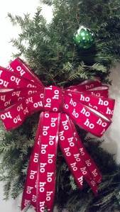 I didn't realize that half of the ho-ho-ho's were upside down until after I glued it on.  Oh well... 